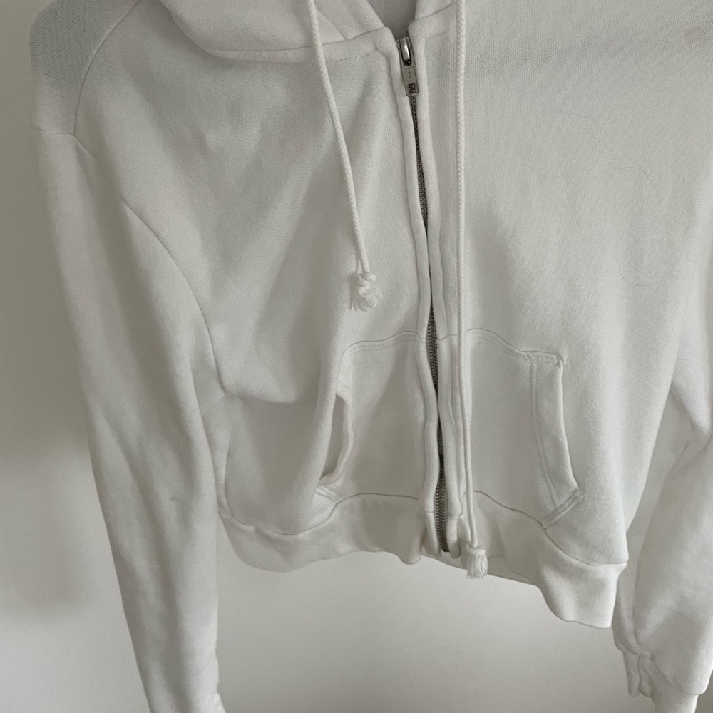 White zip up hoodie from Brandy Melville